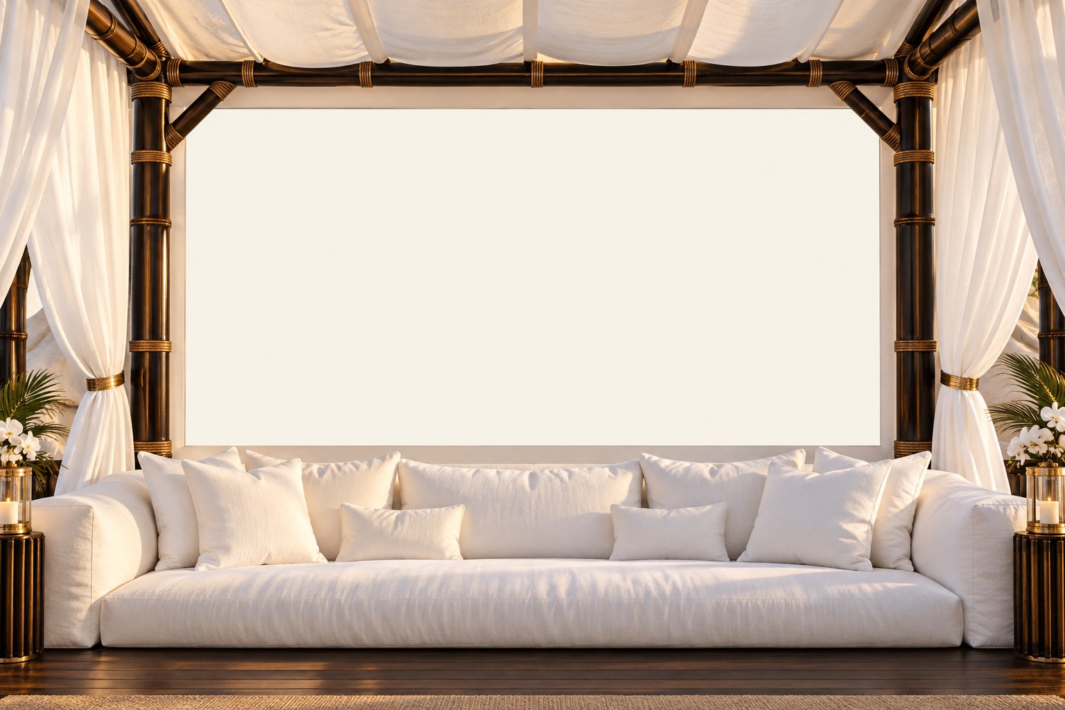White cabana with dark stained bamboo posts and a plush white couch